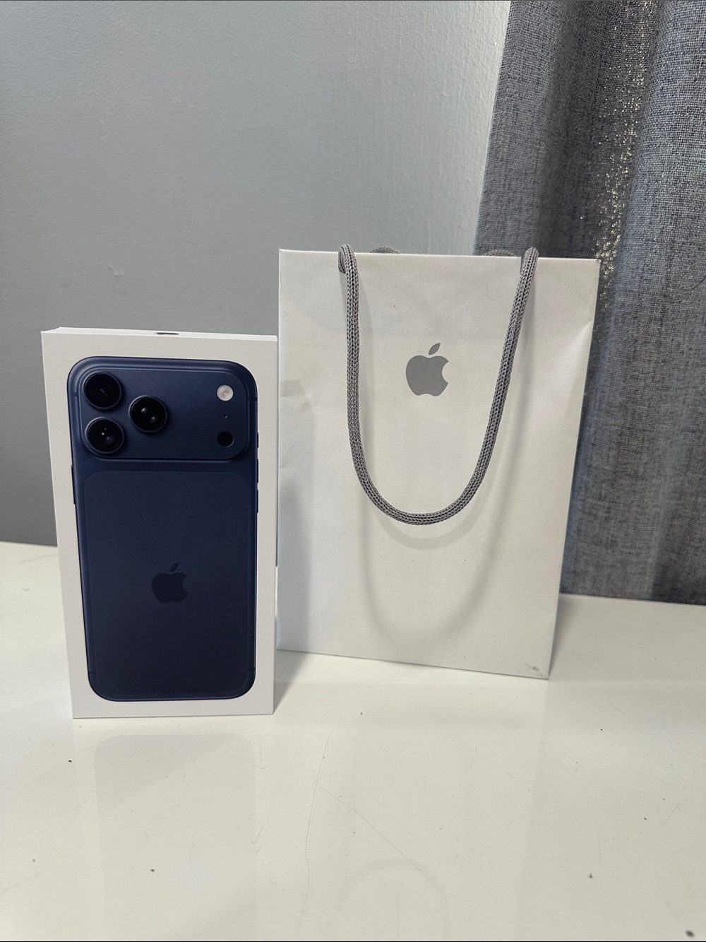 Authentic empty Apple iPhone 17Pro Max - Midnight Blue Finish box and bag.